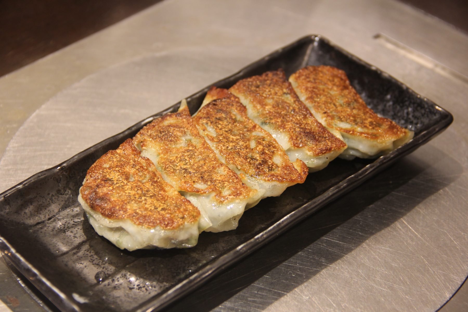 Chicago Kalbi Korean Bbq signature dishes Crispy Fried Pajeon
Beef Gyoza
Bibimbap
